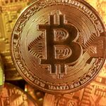 ビットコイン下げ止まらず7万ドル割れ、24年11月以来の安値 | ロイター