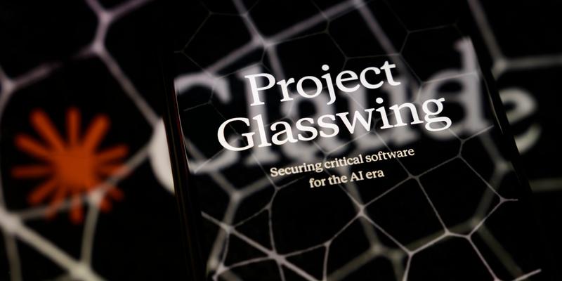 Project Glasswing shown on a cracked smartphone on a dark fractured background